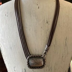 Ladies “Silpada” necklace leather and sterling silver front pendant. Length of 9